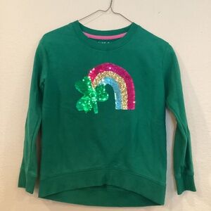 Size 10/12, brand Cat and Jack, emerald green St. Patrick’s day sweater.